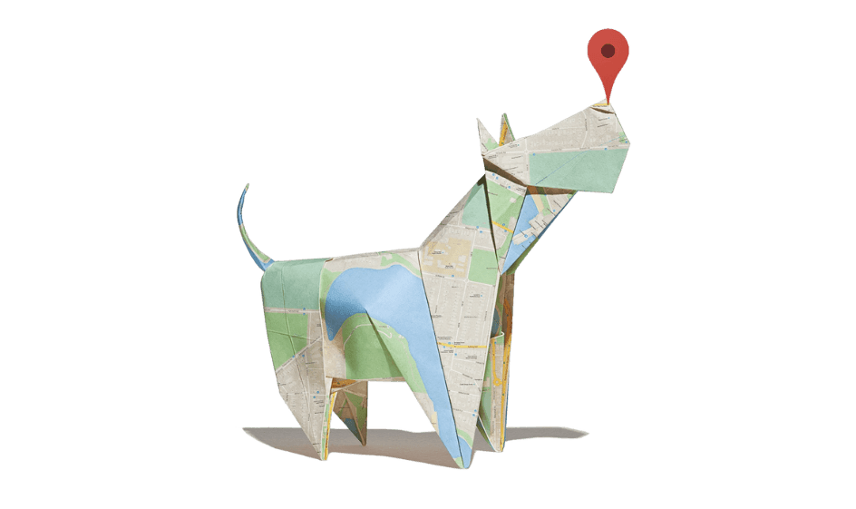 Origami-style dog made from maps with a red location pin on its nose.